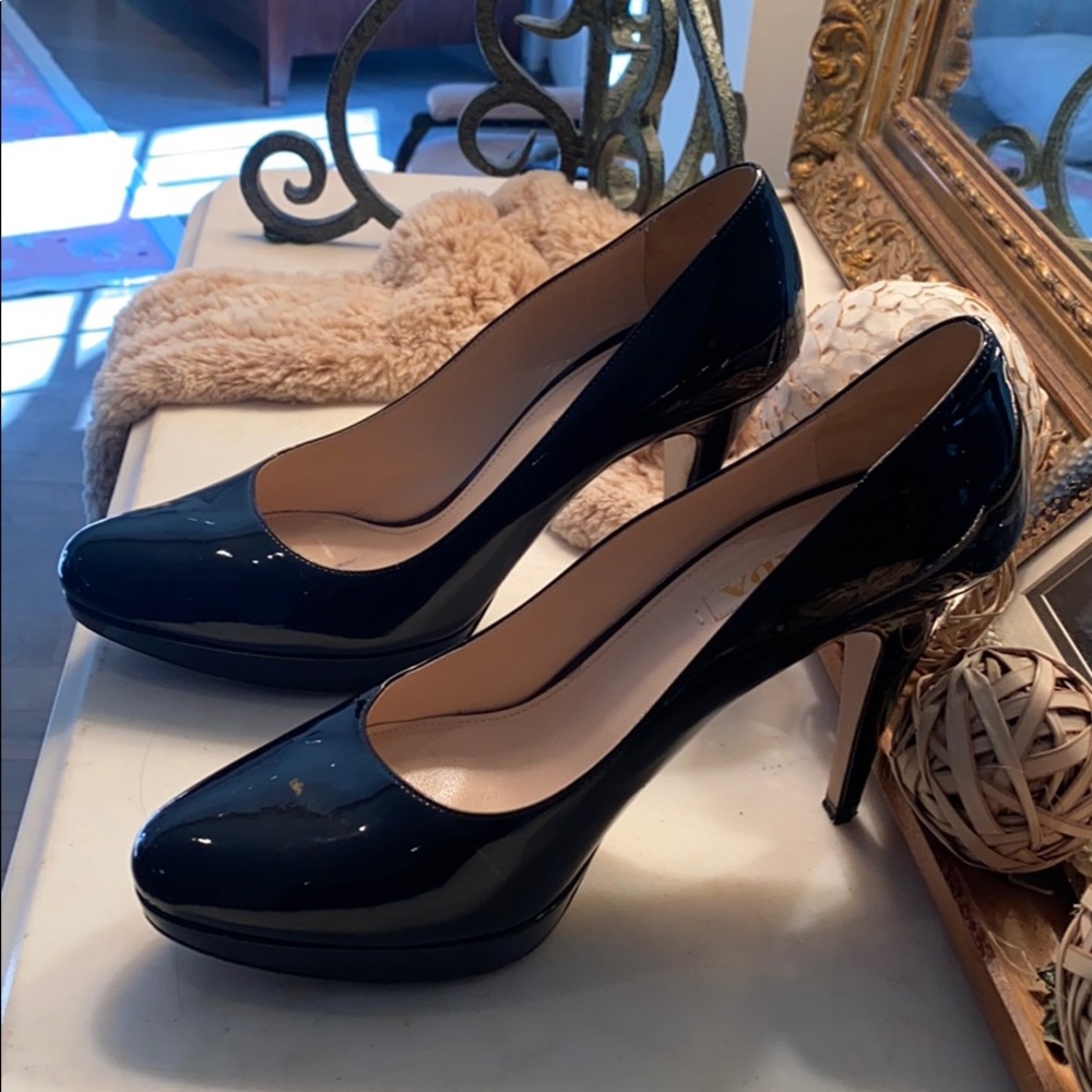 Patent leather Prada pumps